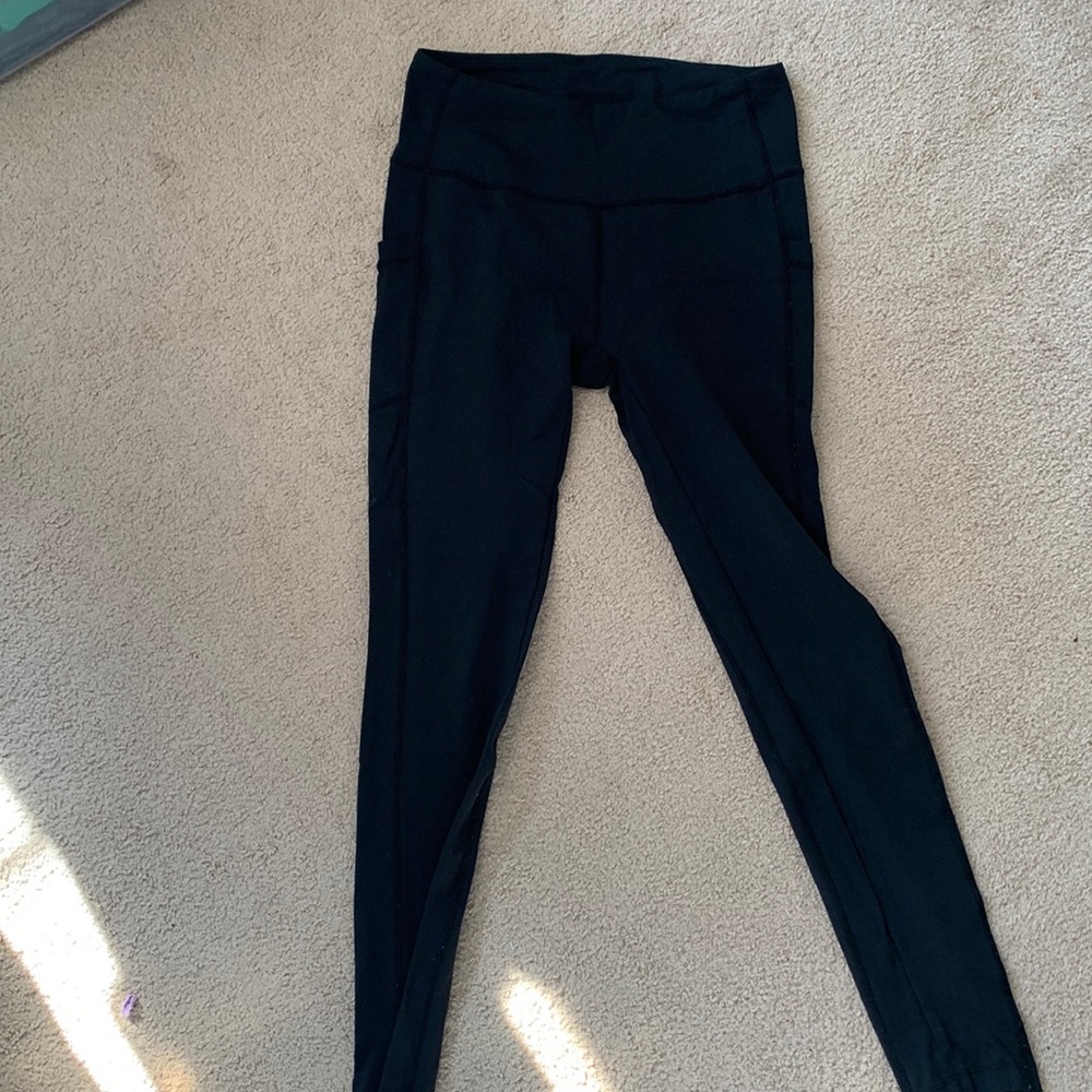 Like new condition! Size M- full length legging with pockets on both sides